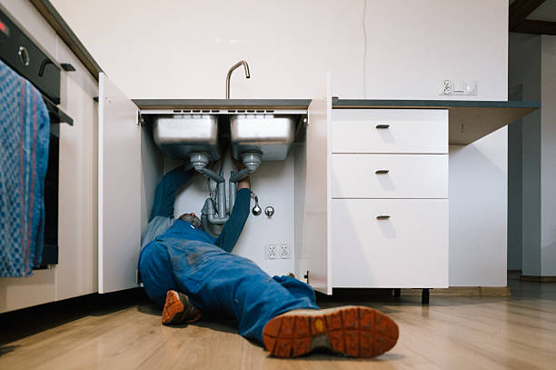 Professional Drain Cleaning technician working in Lake Como, FL